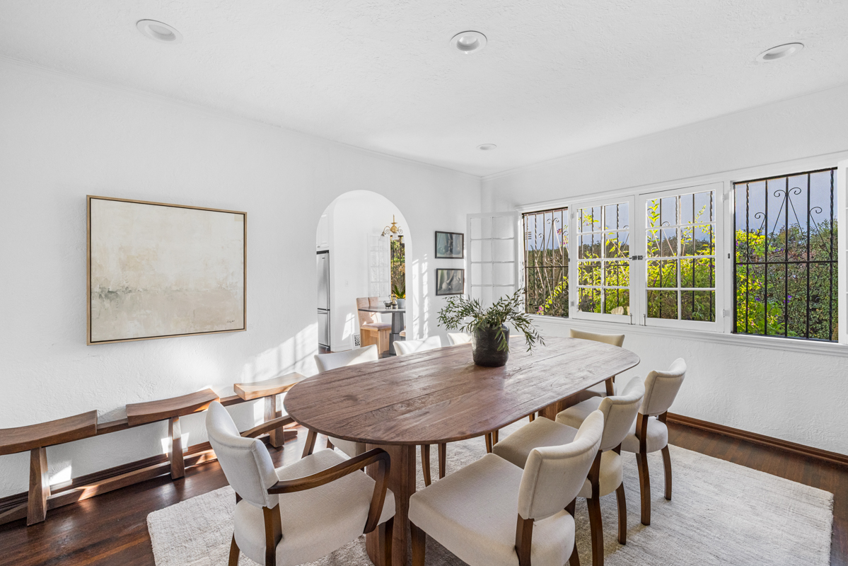 926 Burnside Avenue Los Angeles, CA 90036 - Photo 12 of 71 a view of a dining room with furniture window and wooden floor