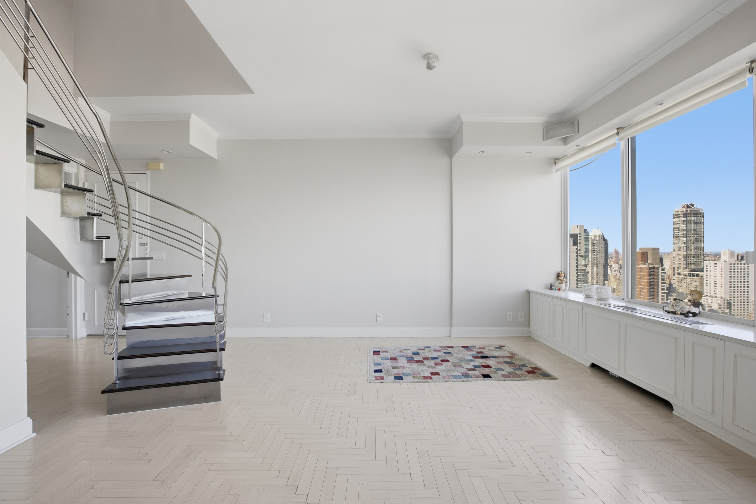 418 East 59th Street, Unit PHA Manhattan, NY 10022 - Photo 3 of 17 a view of kitchen and utility room