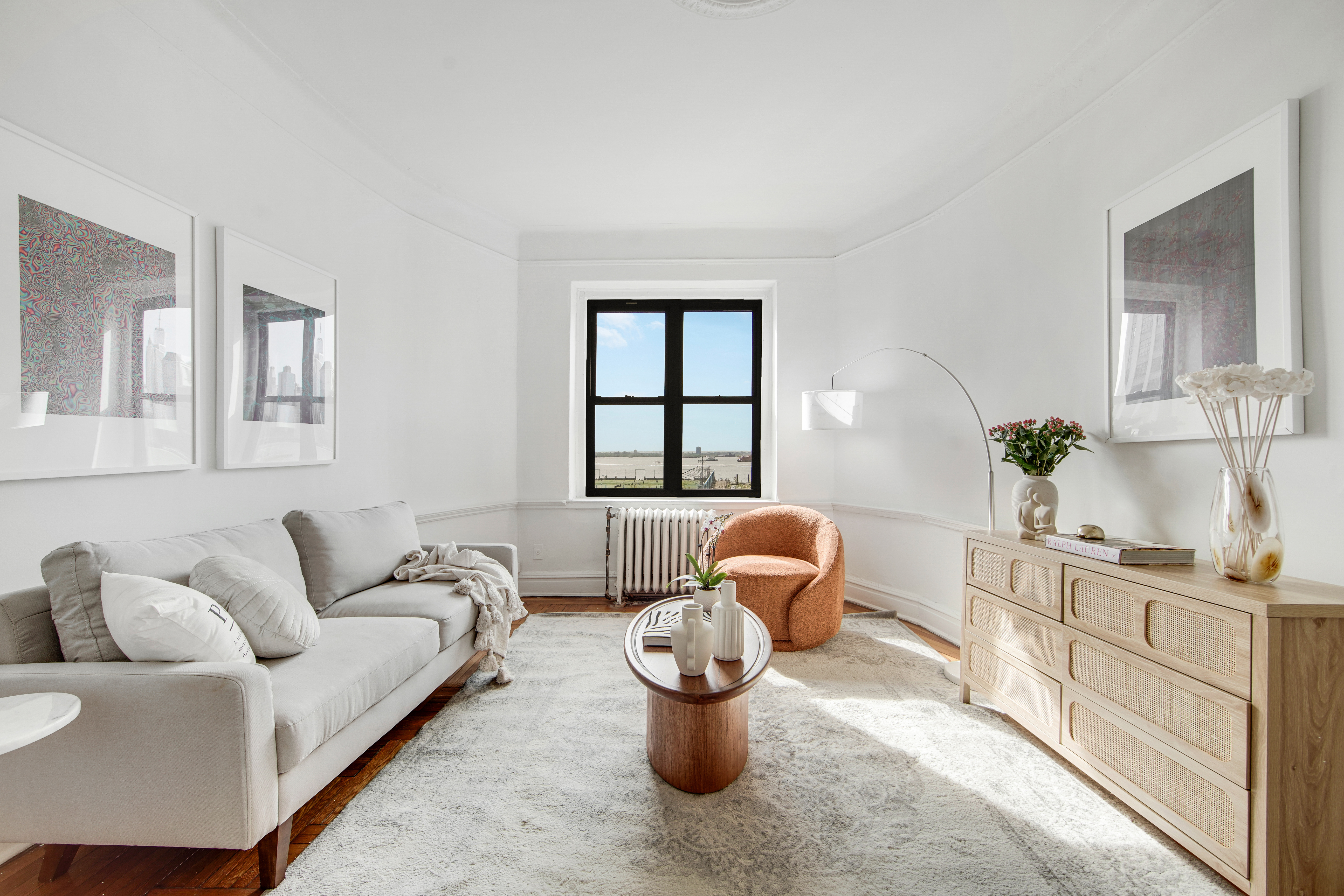 2 Grace Court, Unit 1X Brooklyn, NY 11201 - Photo 2 of 12 a living room with furniture and a large window