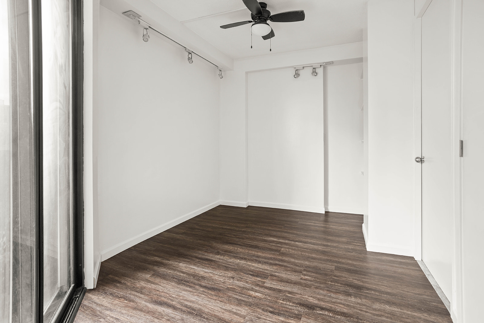233 East 86th Street, Unit 16A Manhattan, NY 10028 - Photo 5 of 7 a view of empty room with wooden floor