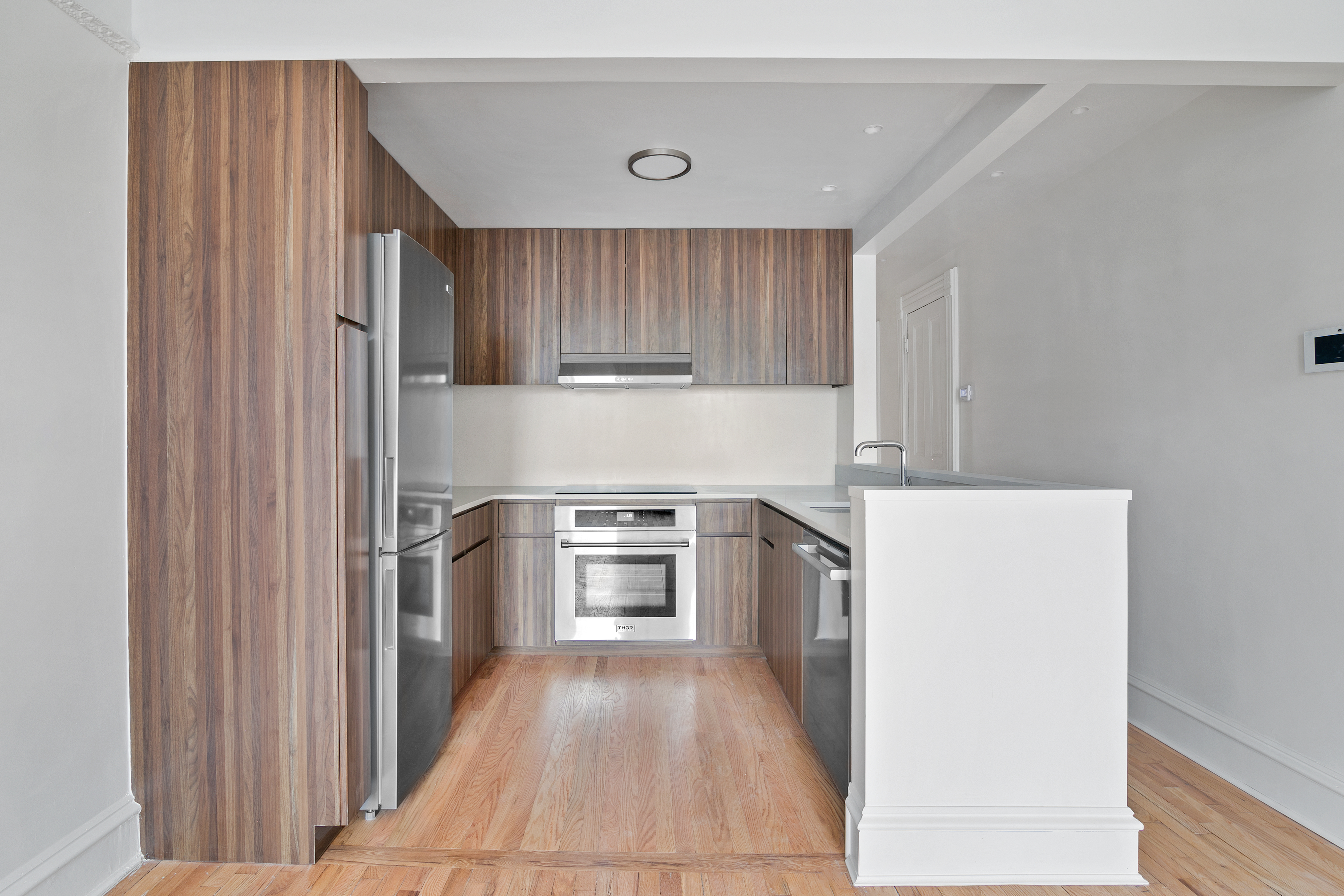 914 President Street, Unit TWNHSE Brooklyn, NY 11215 - Photo 20 of 29 a kitchen with a refrigerator sink and stove