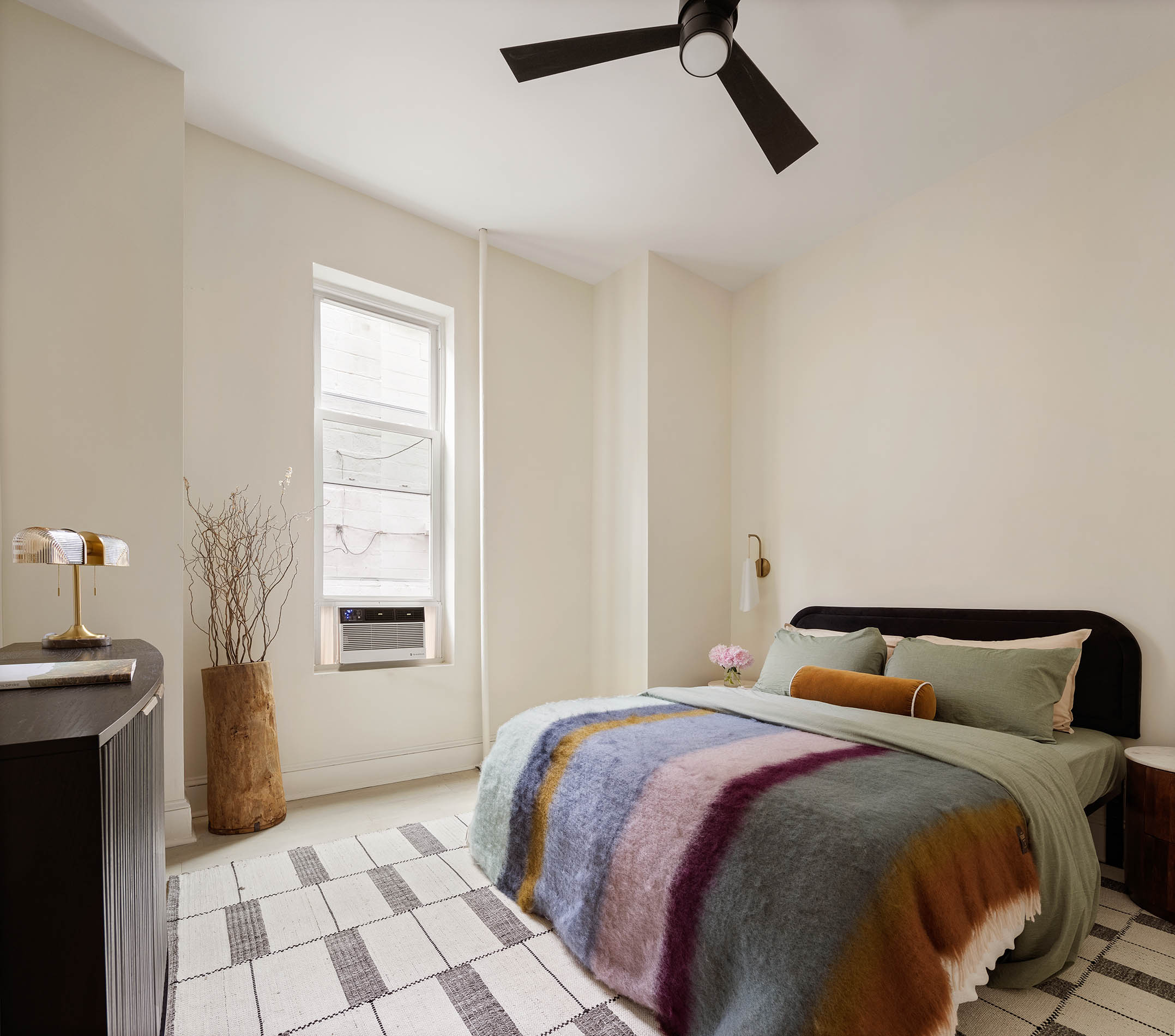 252 Greene Avenue, Unit 1B Brooklyn, NY 11238 - Photo 6 of 16 a bedroom with a bed and a window