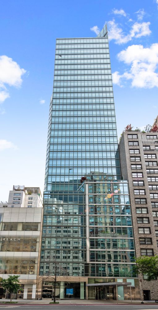 207 East 57th Street, Unit 12A Manhattan, NY 10022 - Photo 12 of 13 a front view of a building