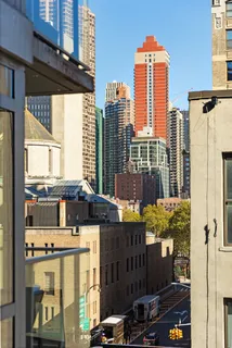 a front view of a building with glass windows and door