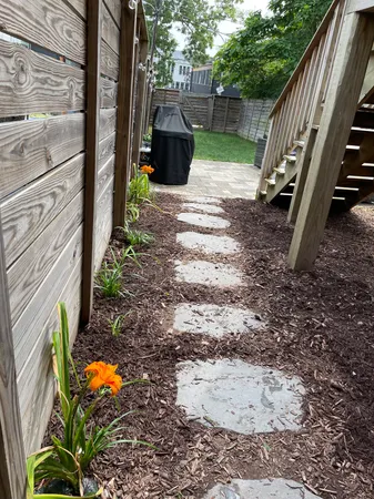 a view of yard with patio
