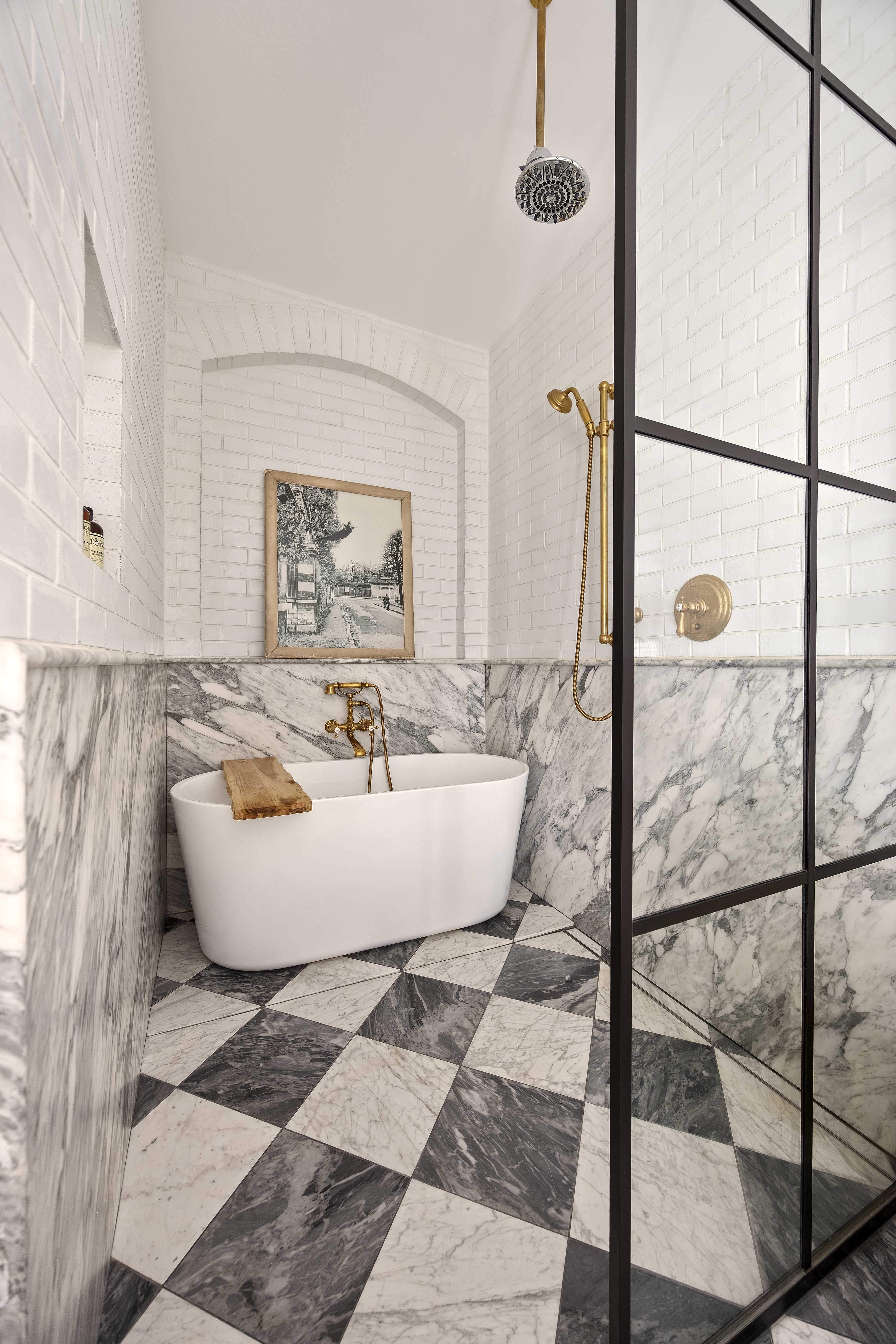 182 Lafayette Street, Unit 5 Manhattan, NY 10013 - Photo 16 of 19 a view of a bathtub in a room