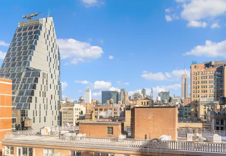 a view of a city with tall buildings