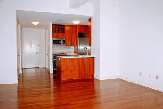 88 Greenwich Street, Unit 1218 Manhattan, NY 10006 - Photo 8 of 30 a view of a living room with hardwood floor