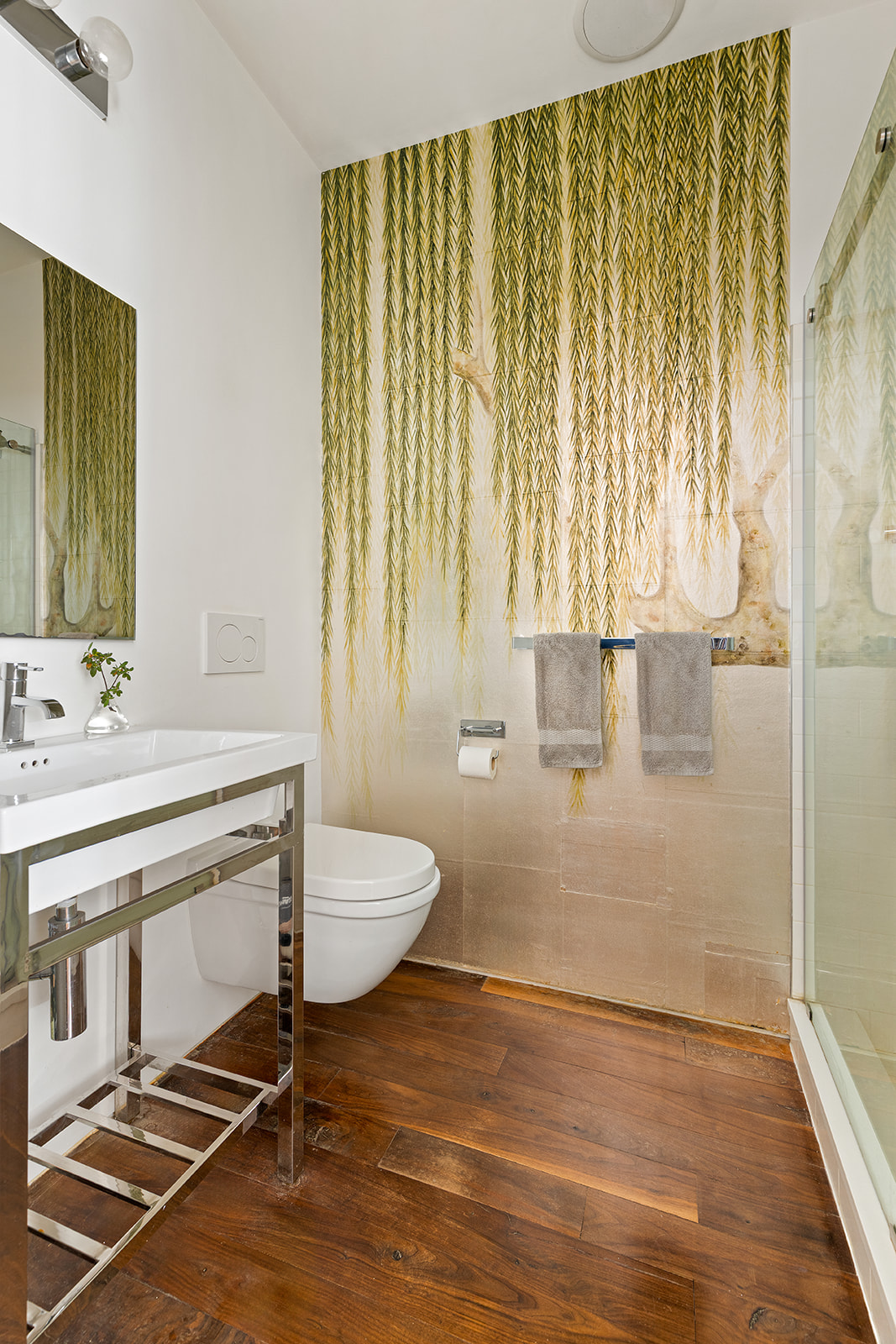 192 Saint Marks Avenue Brooklyn, NY 11238 - Photo 14 of 24 a bathroom with a sink and a mirror