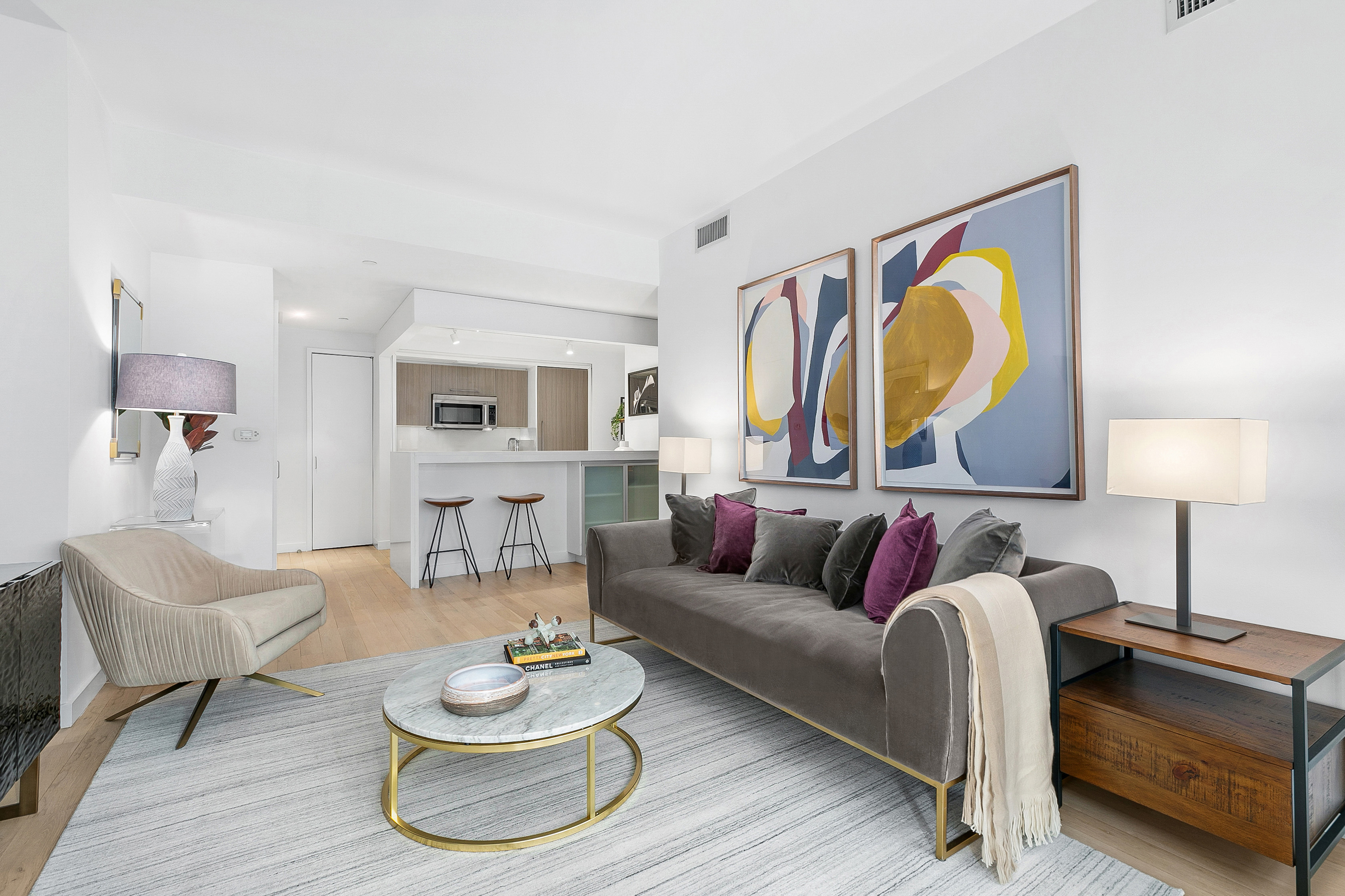 50 Franklin Street, Unit 9A Manhattan, NY 10013 - Photo 2 of 7 a living room with furniture and a lamp
