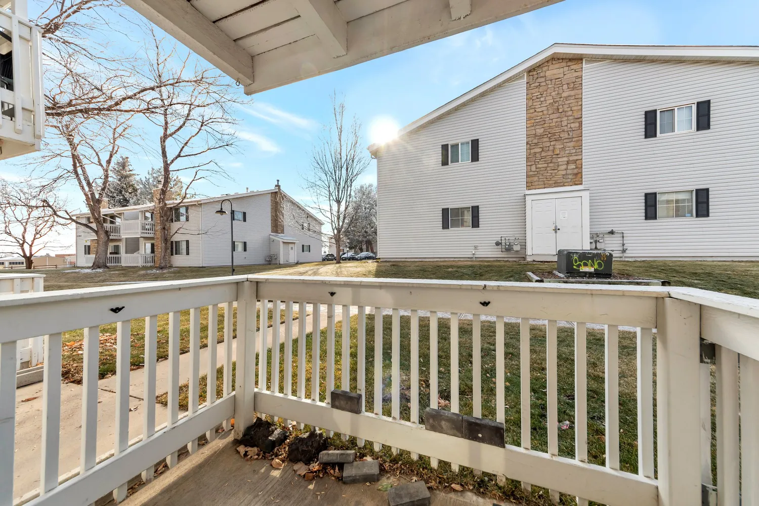 a view of a house with a small yard