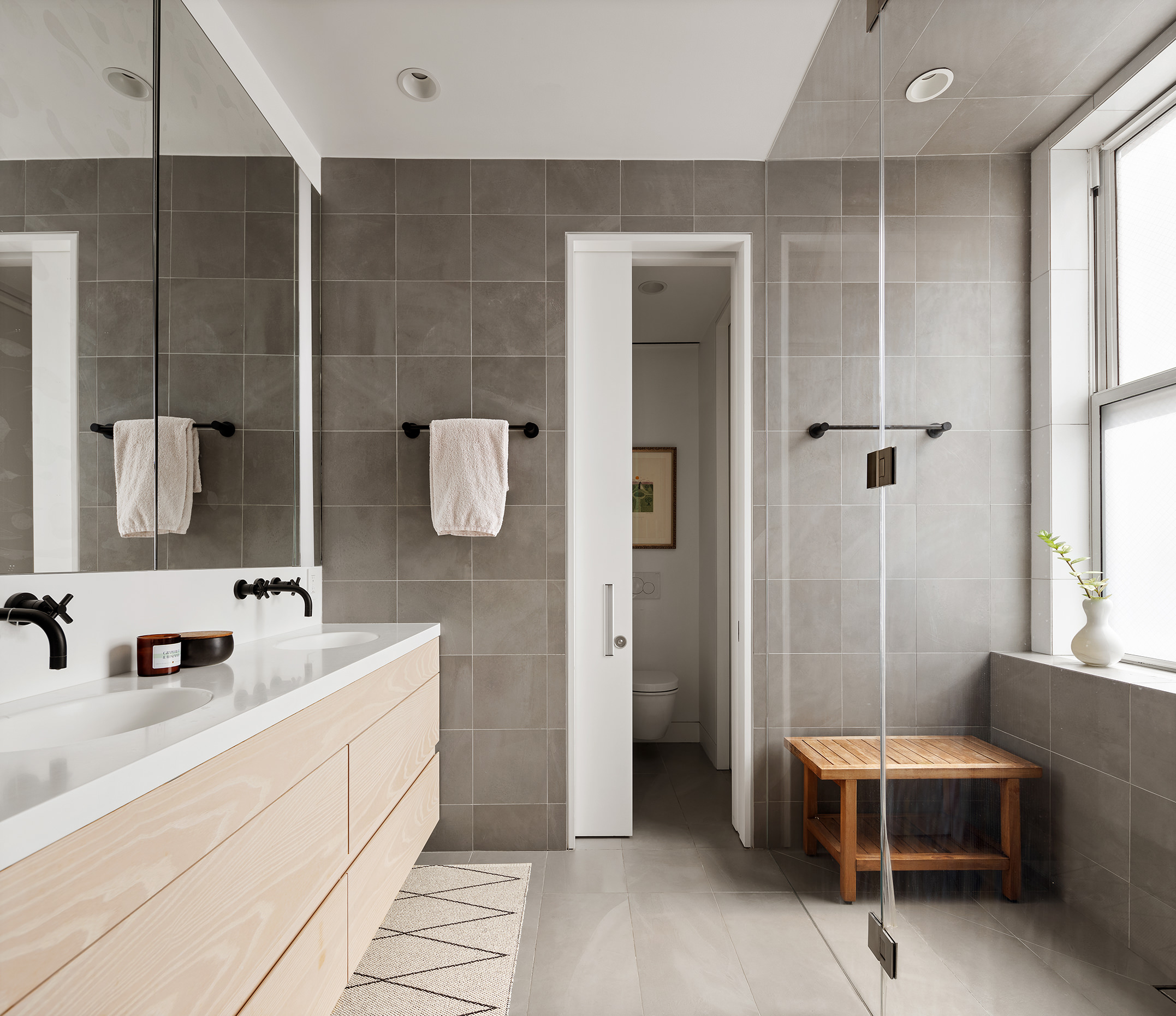 24 West 30th Street, Unit 7F Manhattan, NY 10001 - Photo 12 of 13 a bathroom with a sink and a mirror