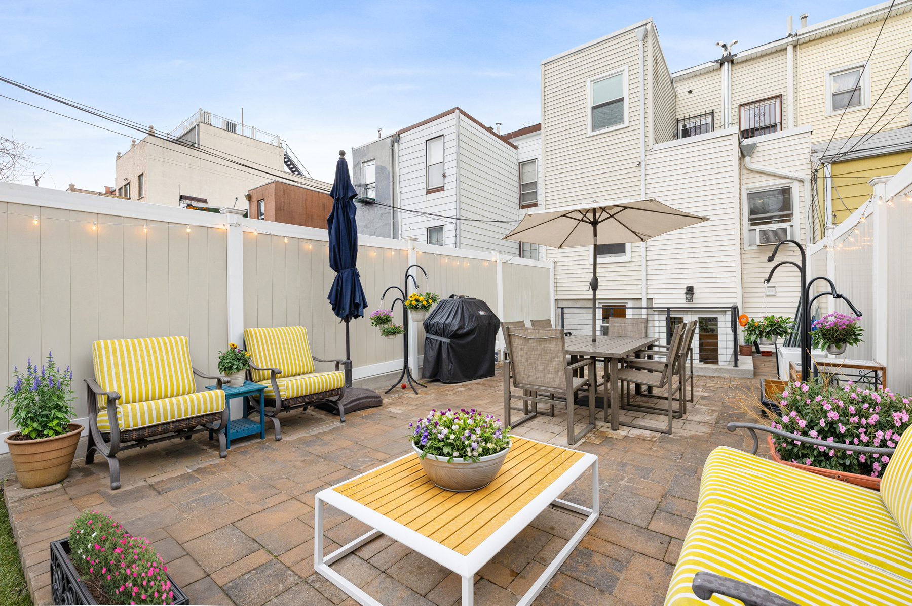 202 22nd Street Brooklyn, NY 11232 - Photo 12 of 28 a view of a patio with dining table and chairs