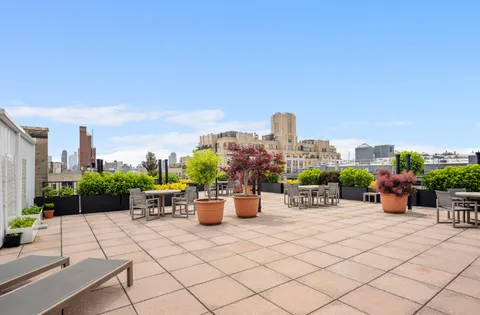 a view of a terrace with furniture