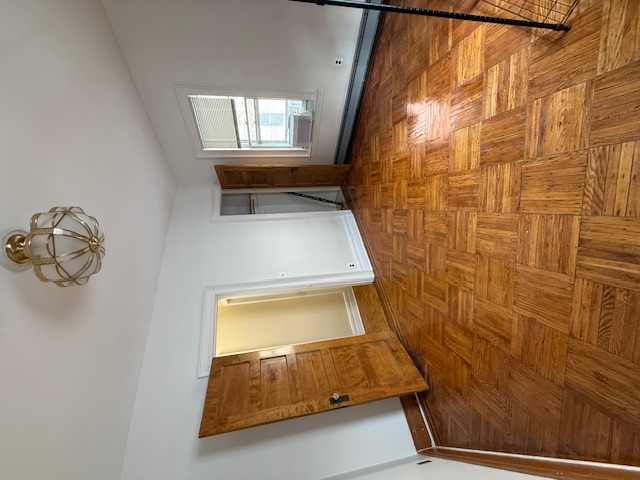 1587 East 18th Street, Unit 2 Brooklyn, NY 11230 - Photo 9 of 13 an empty room with window