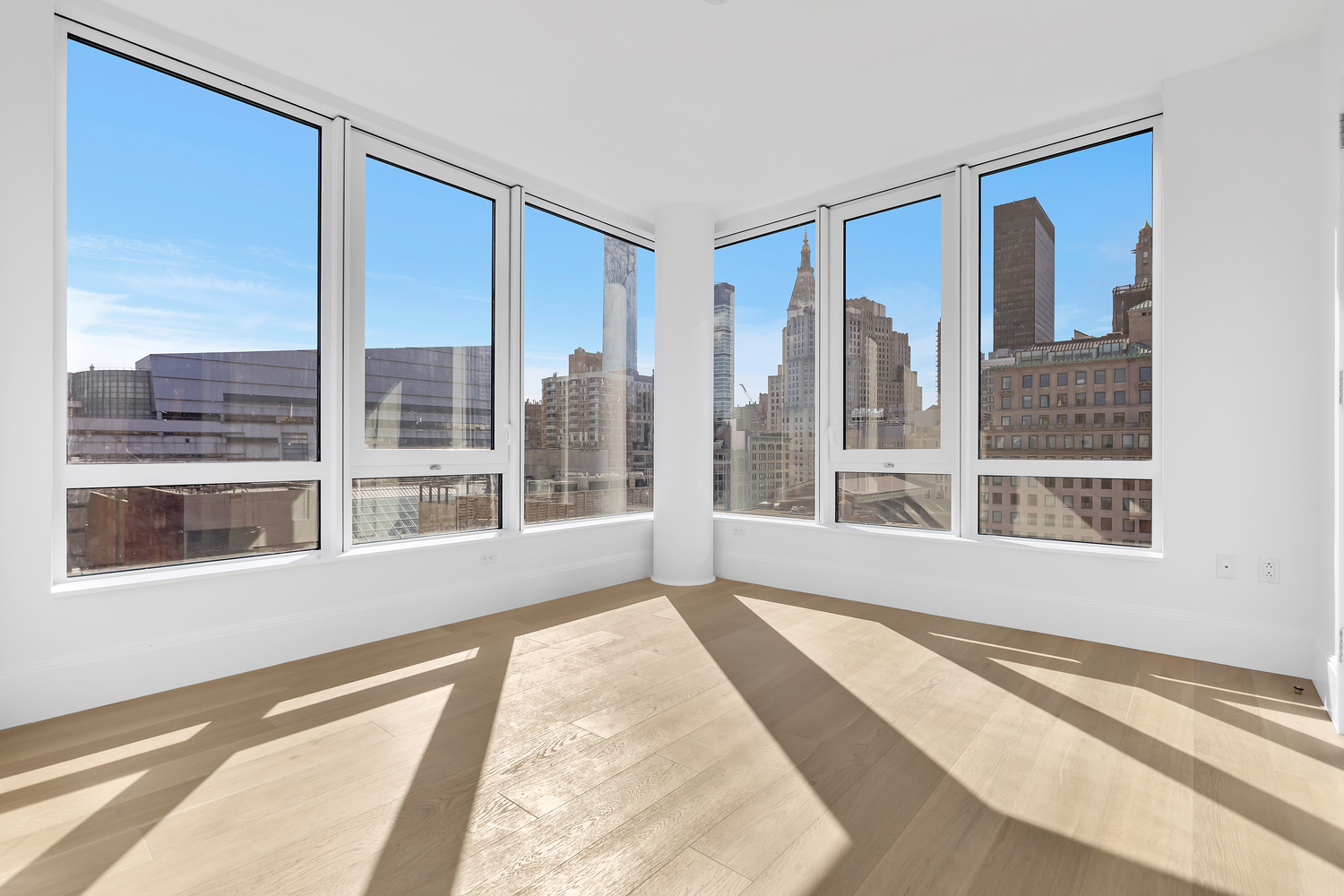 a view of a room with a large window