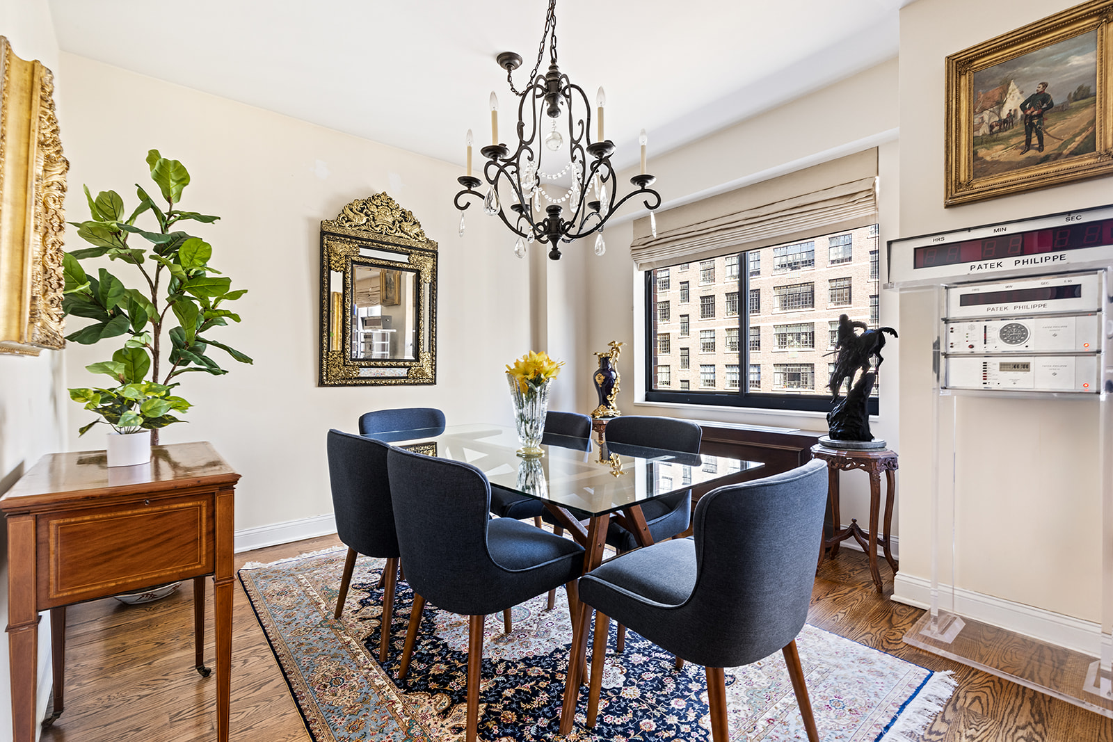 350 East 72nd Street, Unit 12A Manhattan, NY 10021 - Photo 2 of 9 a view of a dining room with furniture window and wooden floor
