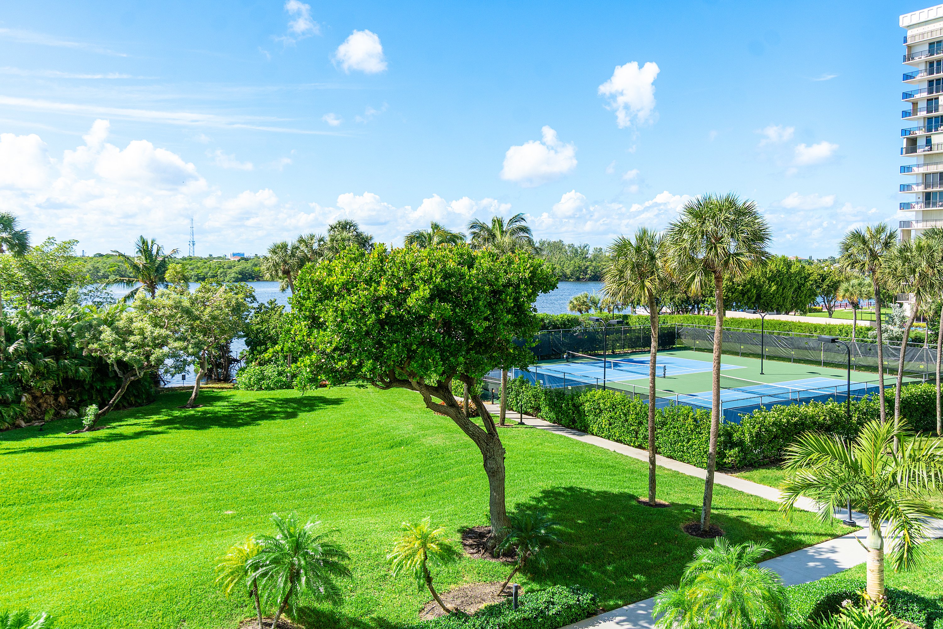 2003 North Ocean Boulevard, Unit 305 Boca Raton, FL 33431 - Photo 24 of 56 a view of a golf course with a garden