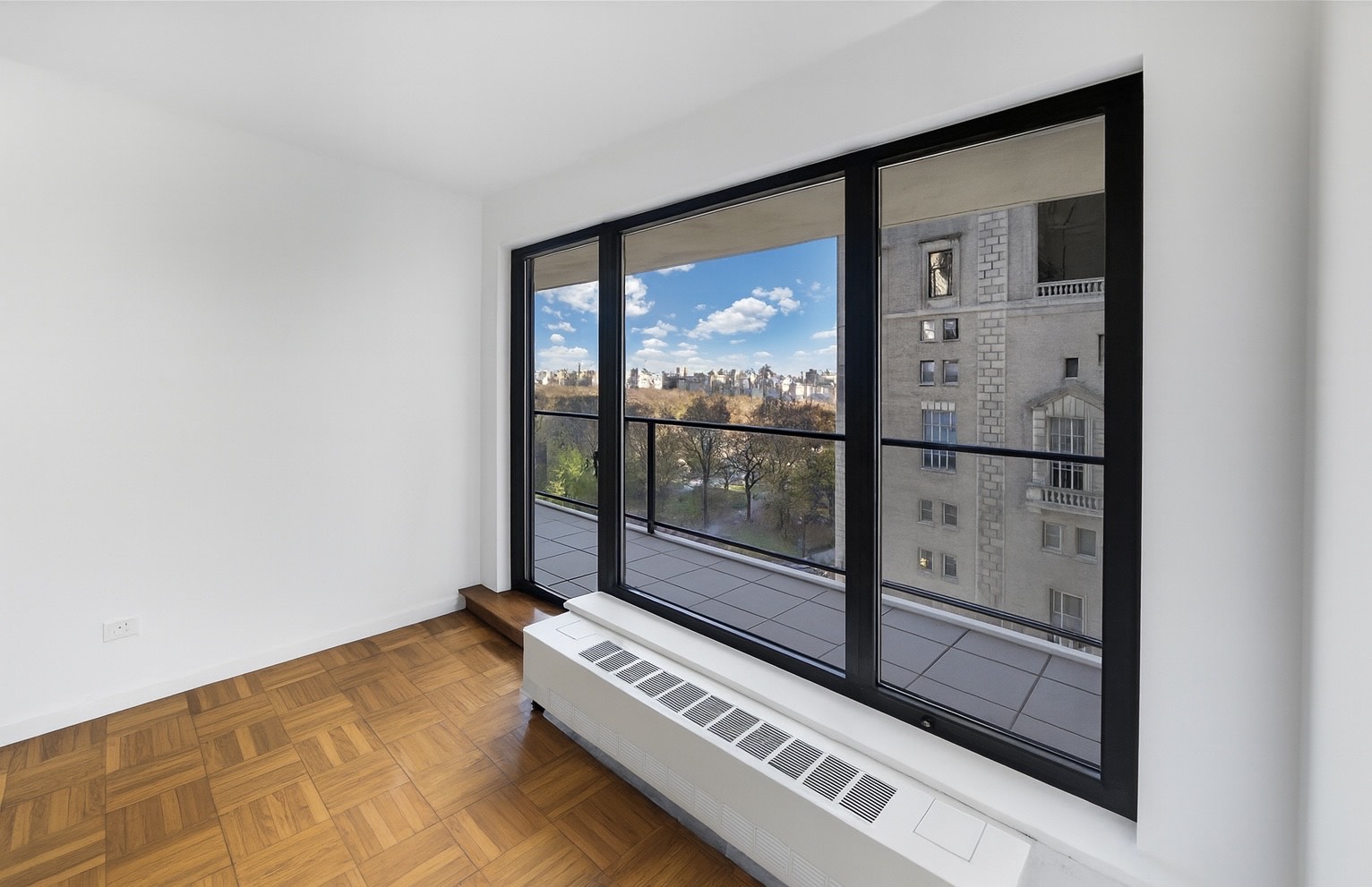 200 Central Park South, Unit 10A Manhattan, NY 10019 - Photo 3 of 10 a view of a room with a large window