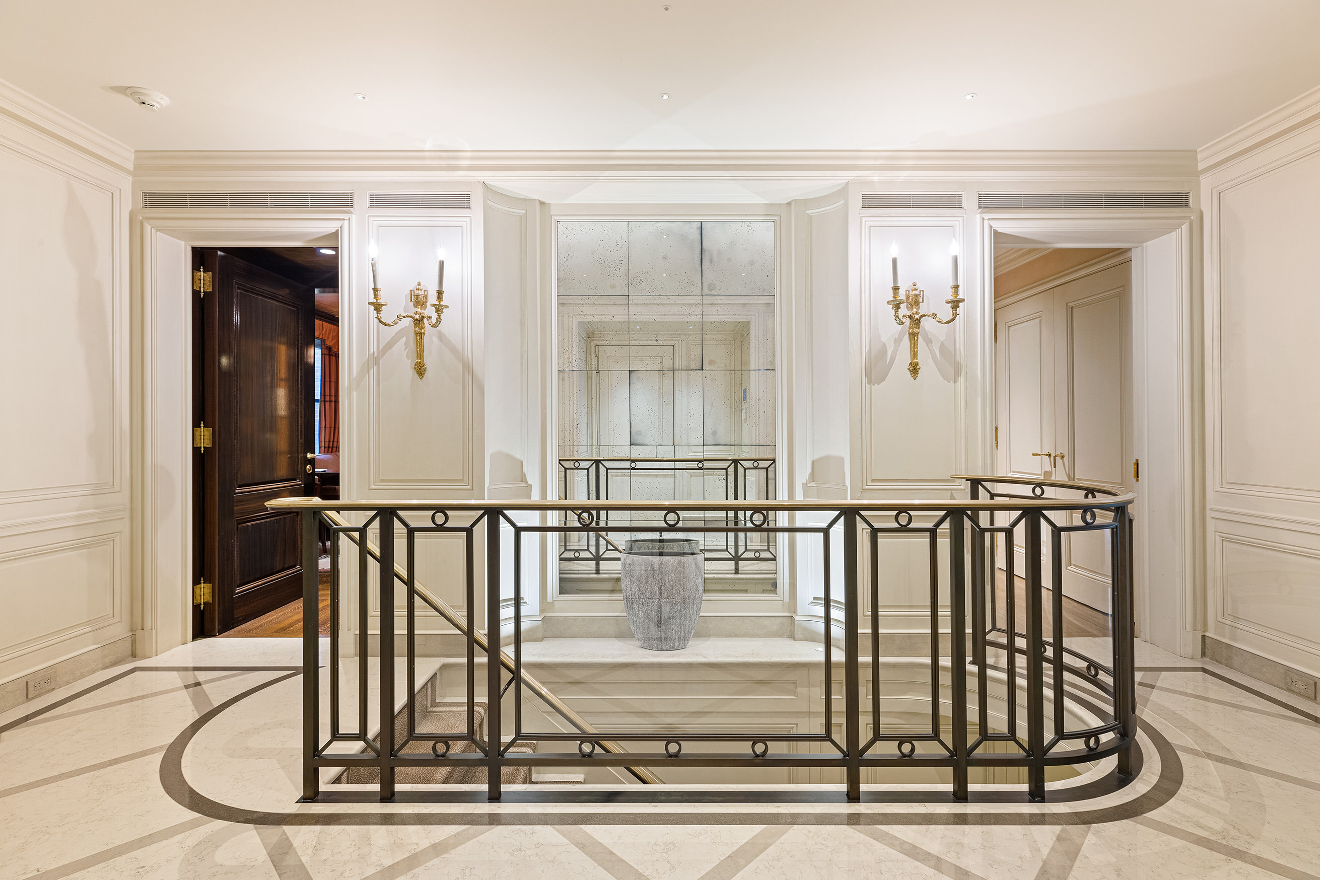 15 West 81st Street, Unit 2D Manhattan, NY 10024 - Photo 4 of 31 a view of staircase with white walls and windows