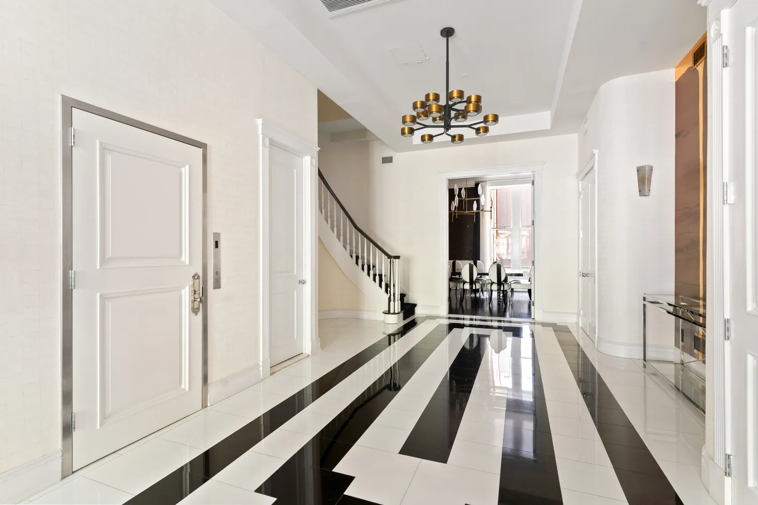 a view of a balcony with a chandelier