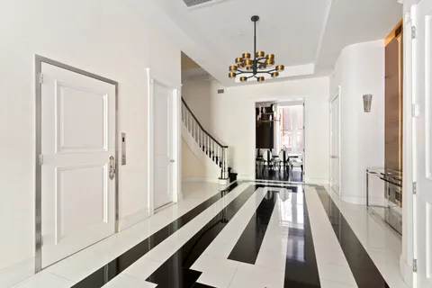 a view of a balcony with a chandelier