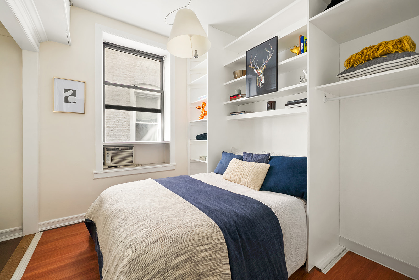 364 West 121st Street, Unit 4A Manhattan, NY 10027 - Photo 6 of 12 a bedroom with a bed and a window