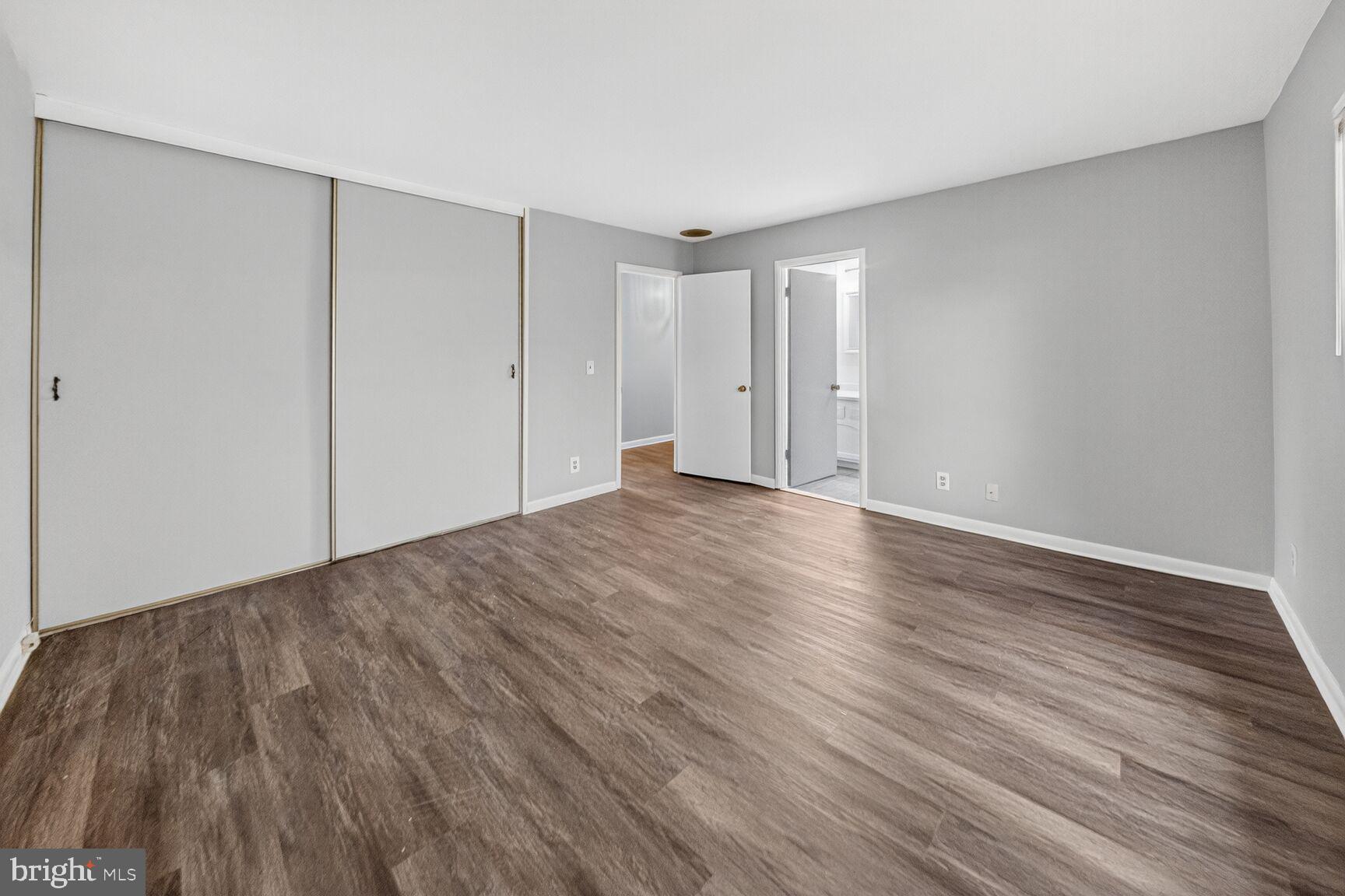 14603 Edelmar Drive, Unit 132A Silver Spring, MD 20906 - Photo 30 of 52 a view of an empty room with wooden floor