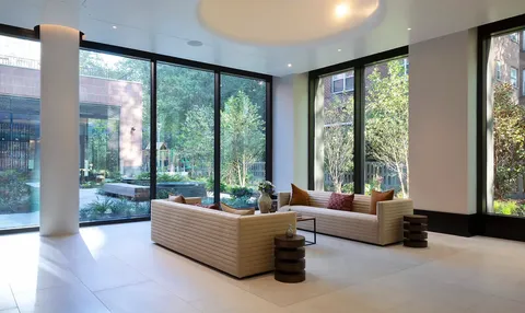 an aerial view of a house with garden space sitting space