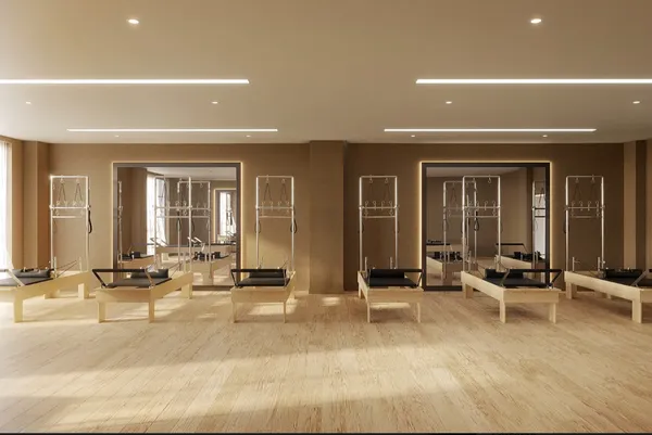 a view of a room with gym equipment and floor to ceiling windows