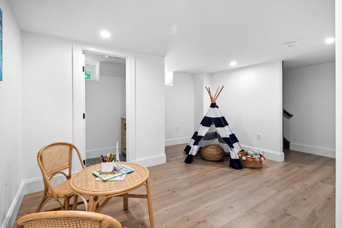 49 Garrison Road Hingham, MA 02043 - Photo 26 of 30 a living room with furniture and a wooden floor