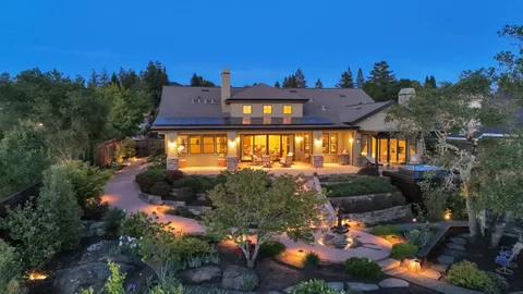 an aerial view of houses with yard