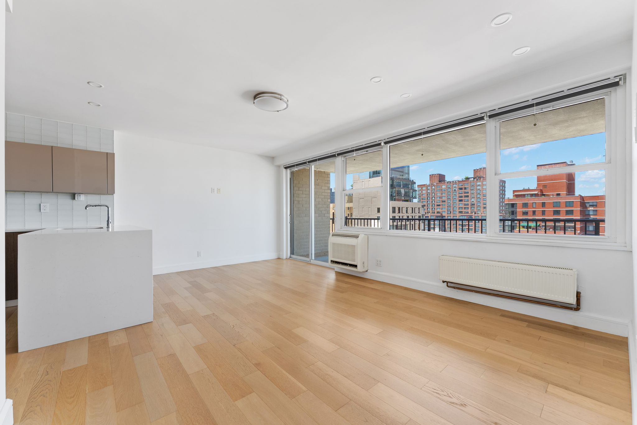 175 West 95th Street, Unit 15D Manhattan, NY 10025 - Photo 2 of 13 a view of kitchen with stainless steel appliances a refrigerator and cabinets