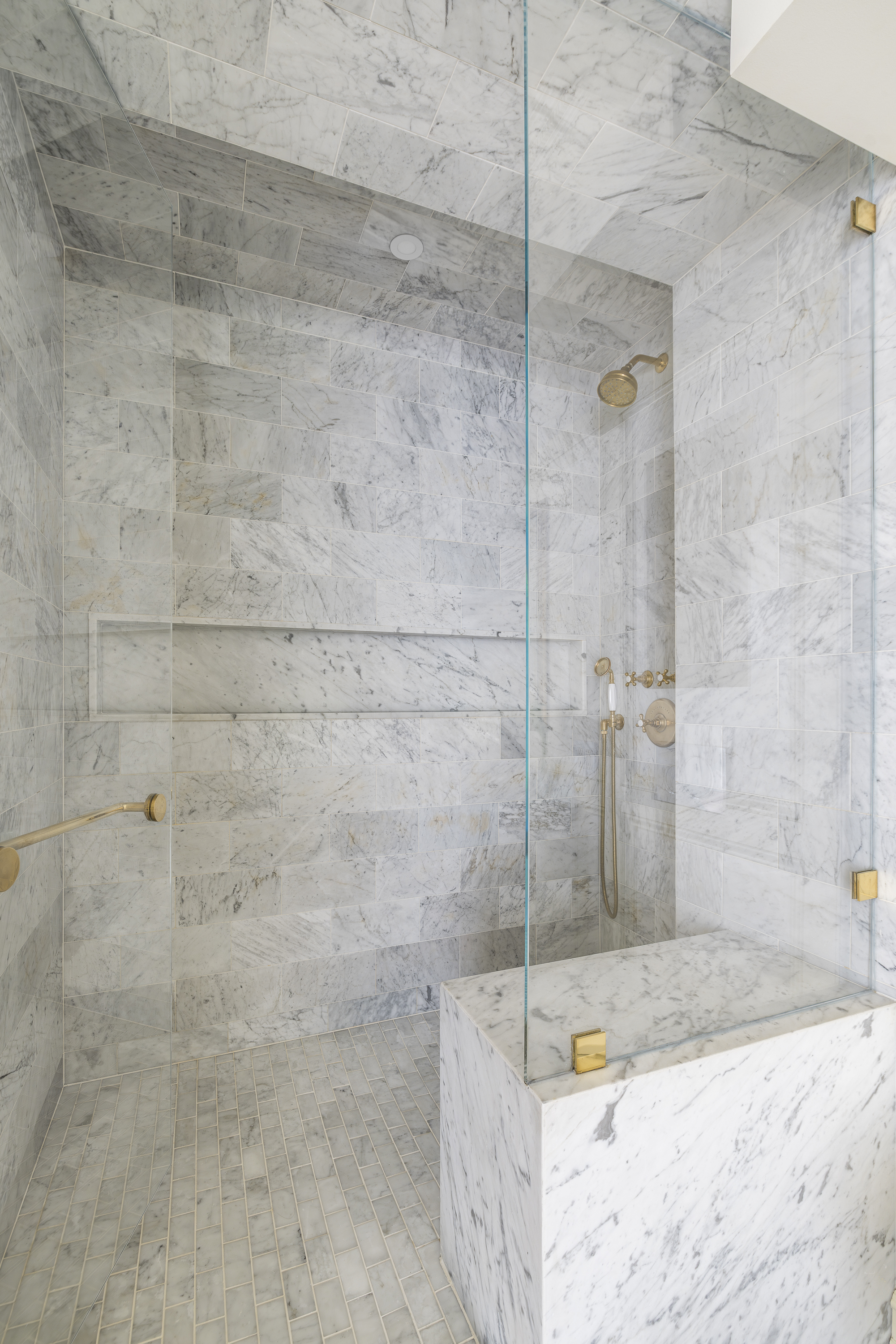 47 East 87th Street, Unit 7A Manhattan, NY 10128 - Photo 13 of 22 a bathroom with a bathtub and shower