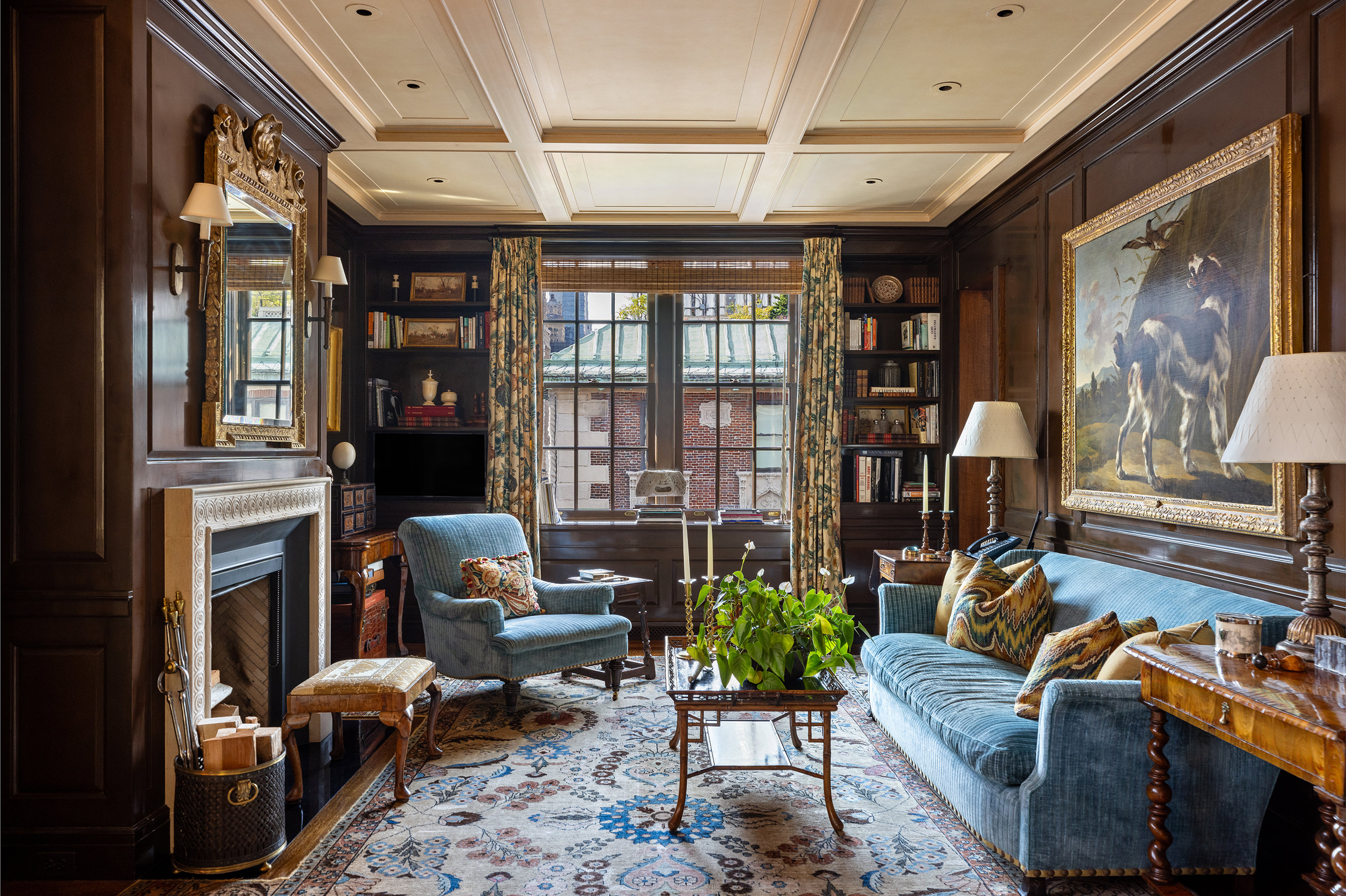 620 Park Avenue, Unit 14 Manhattan, NY 10065 - Photo 18 of 32 a living room with furniture fireplace and flat screen tv