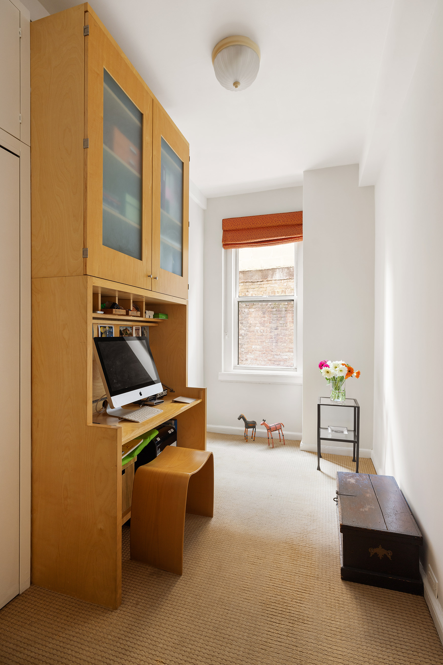 277 West End Avenue, Unit 5D Manhattan, NY 10023 - Photo 9 of 15 a bedroom with furniture and a window