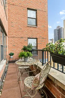 a view of balcony patio and outdoor seating