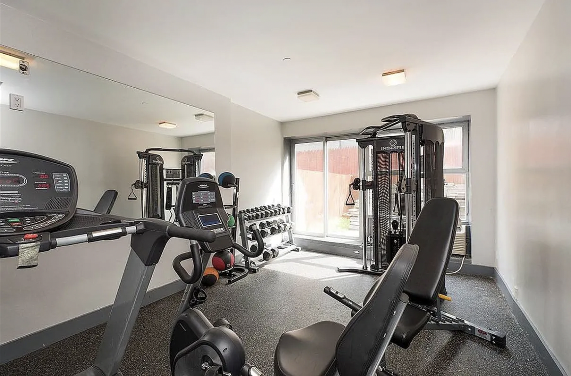105 Grand Avenue, Unit 4L Brooklyn, NY 11205 - Photo 8 of 10 a view of a room with gym equipment
