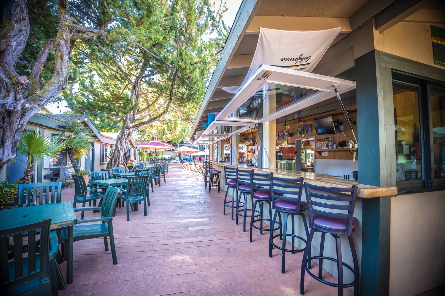a living room with lots of furniture and a chandelier