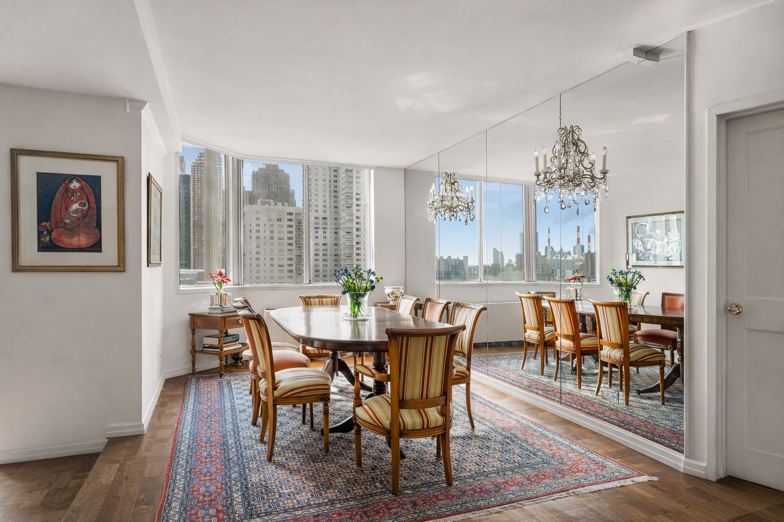 515 East 79th Street, Unit 15A Manhattan, NY 10075 - Photo 5 of 26 a view of a dining room with furniture window and wooden floor