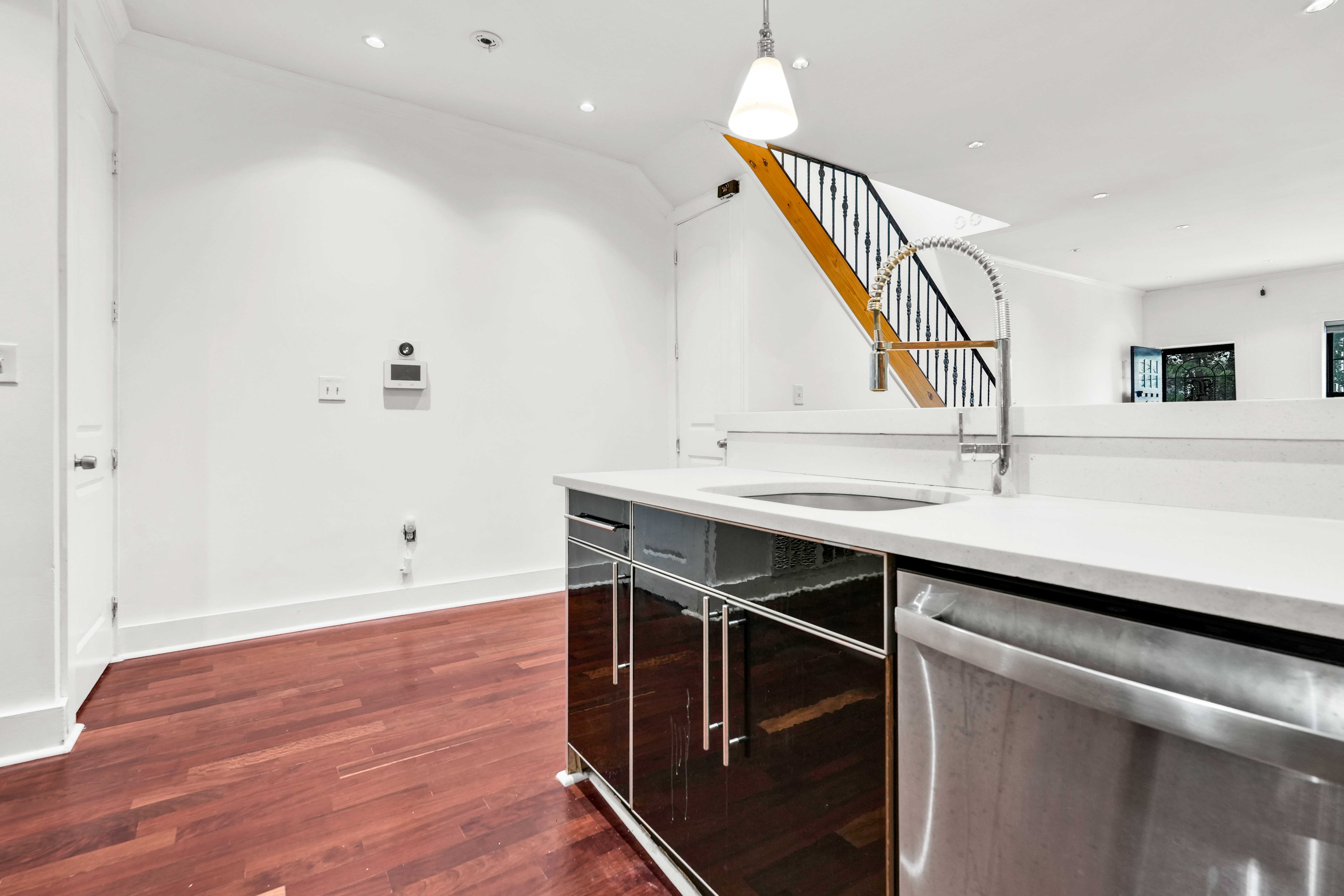 17 A Suydam Place, Unit 2 Brooklyn, NY 11233 - Photo 7 of 28 a view of cabinets and wooden floor