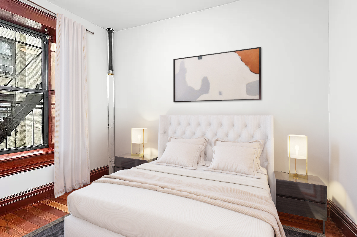 1392 Madison Avenue, Unit 26 Manhattan, NY 10128 - Photo 4 of 5 a bedroom with a bed and a painting on the wall