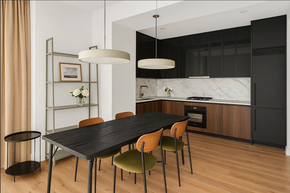a kitchen with a table chairs refrigerator and cabinets