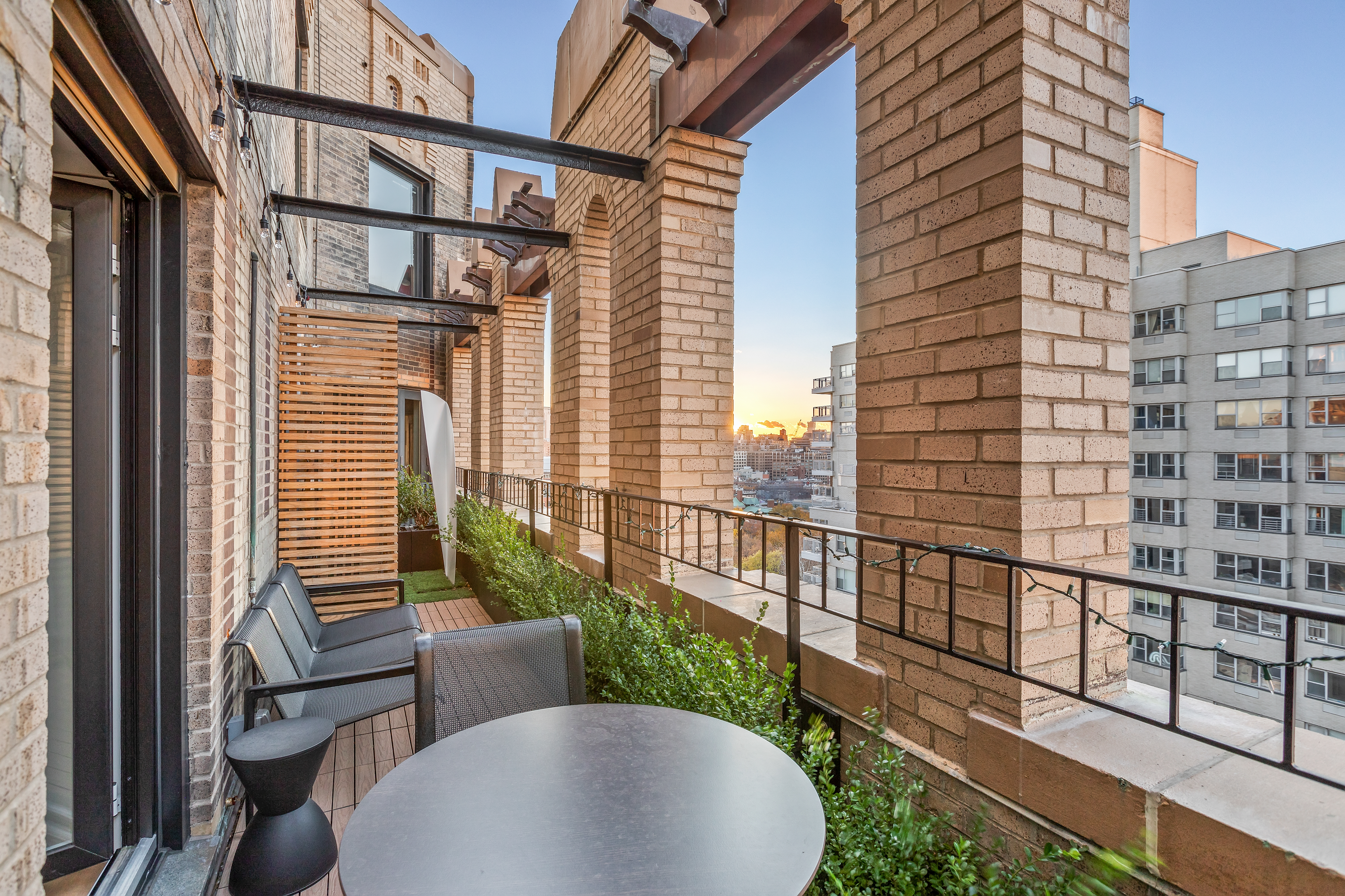 1 5th Avenue, Unit 16F Manhattan, NY 10003 - Photo 1 of 23 a view of a balcony with chairs