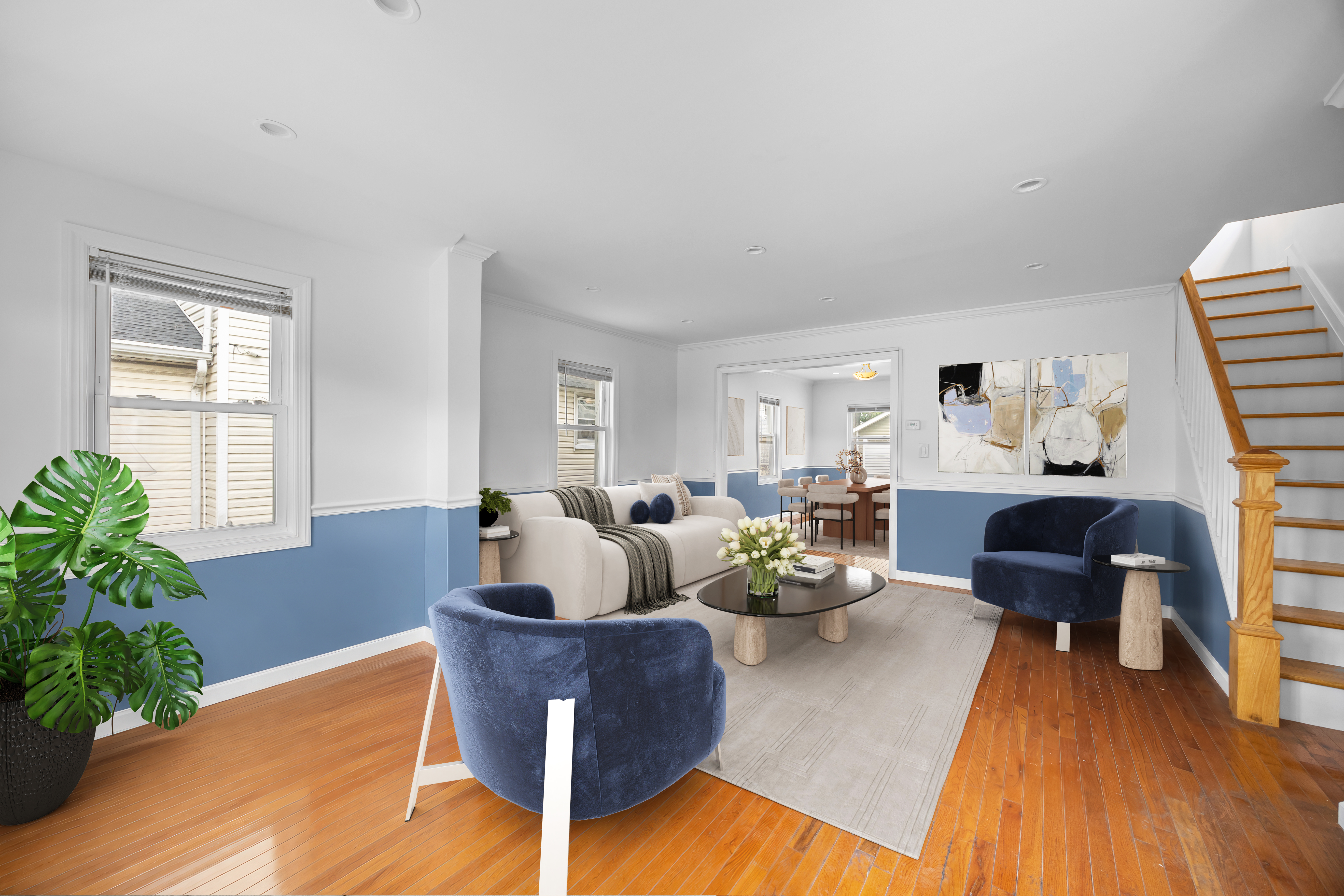 194-35 114th Drive Queens, NY 11412 - Photo 4 of 21 a living room with furniture and a potted plant