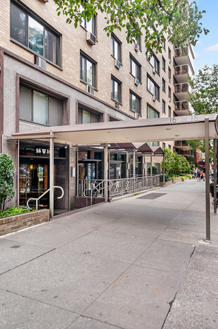 16 West 16th Street, Unit 3RN Manhattan, NY 10011 - Photo 6 of 9 front view of a building with a garden