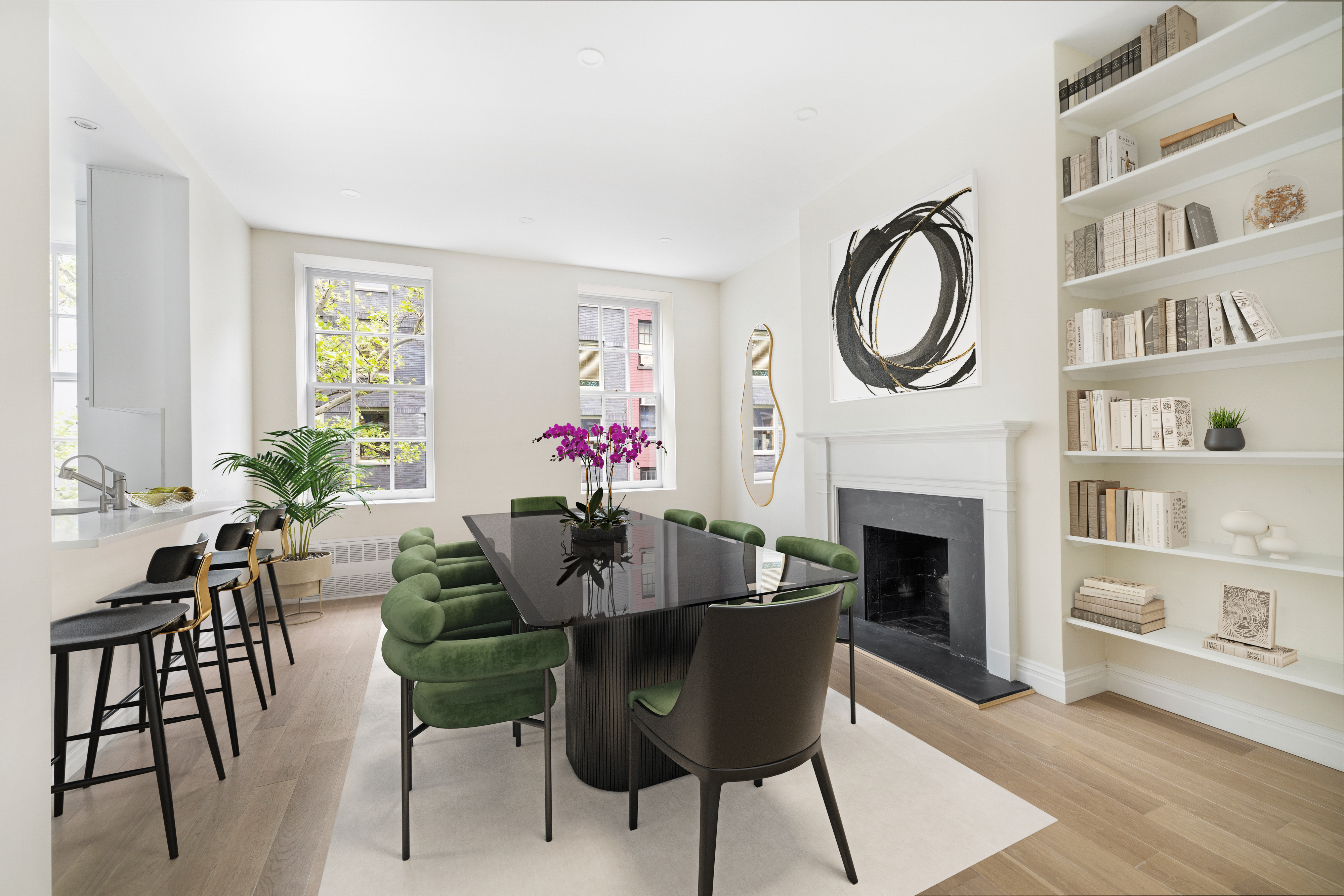 a dining room with furniture a fireplace and a chandelier