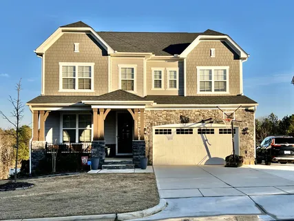 a front view of a house with windows