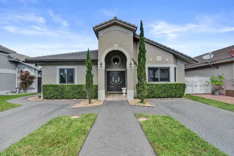 $700,000 | 8741 Northwest 141st Terrace, Miami Lakes, FL 33018