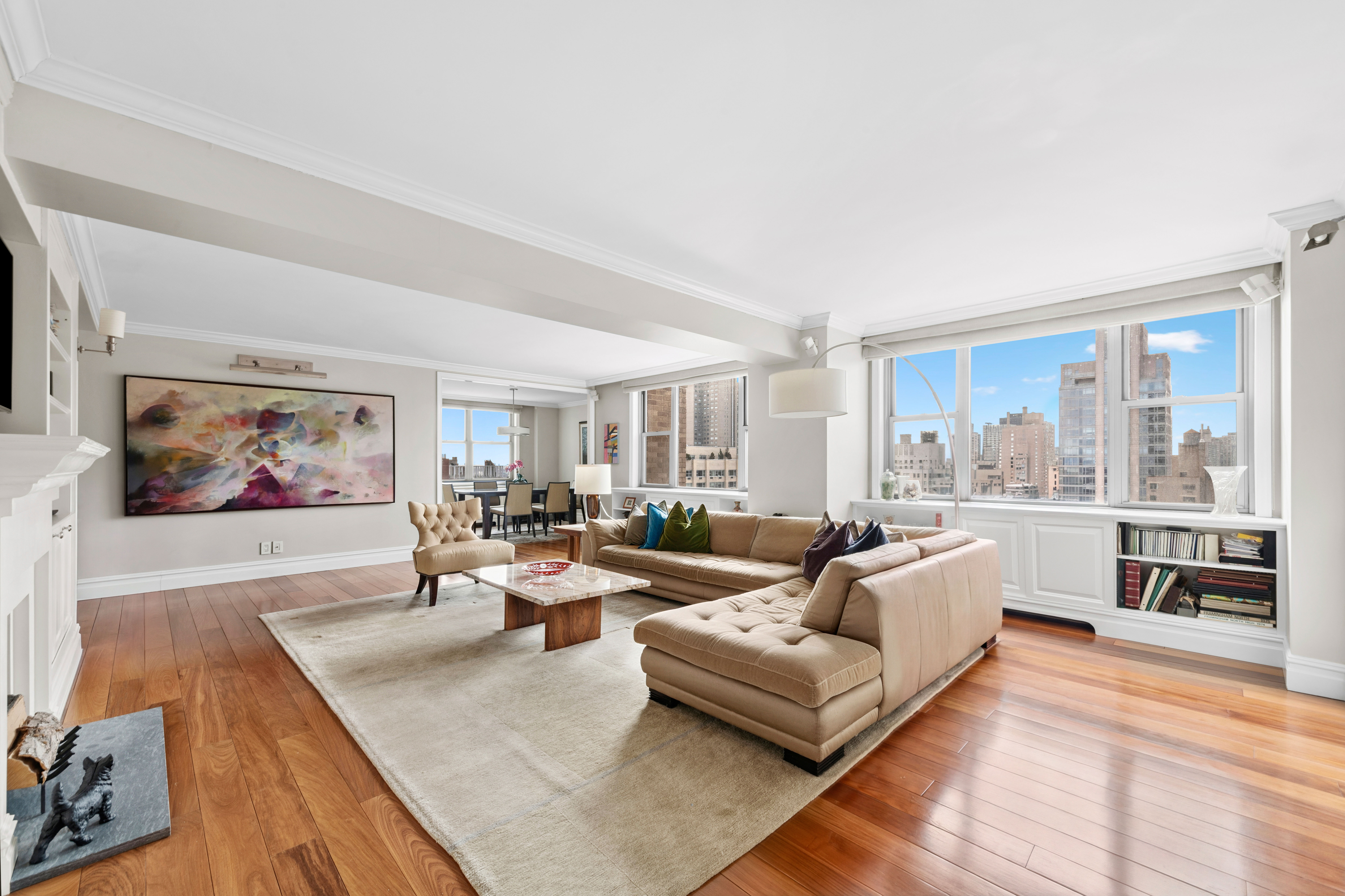 444 East 86th Street, Unit 25EF Manhattan, NY 10028 - Photo 2 of 18 a living room with furniture and a large window